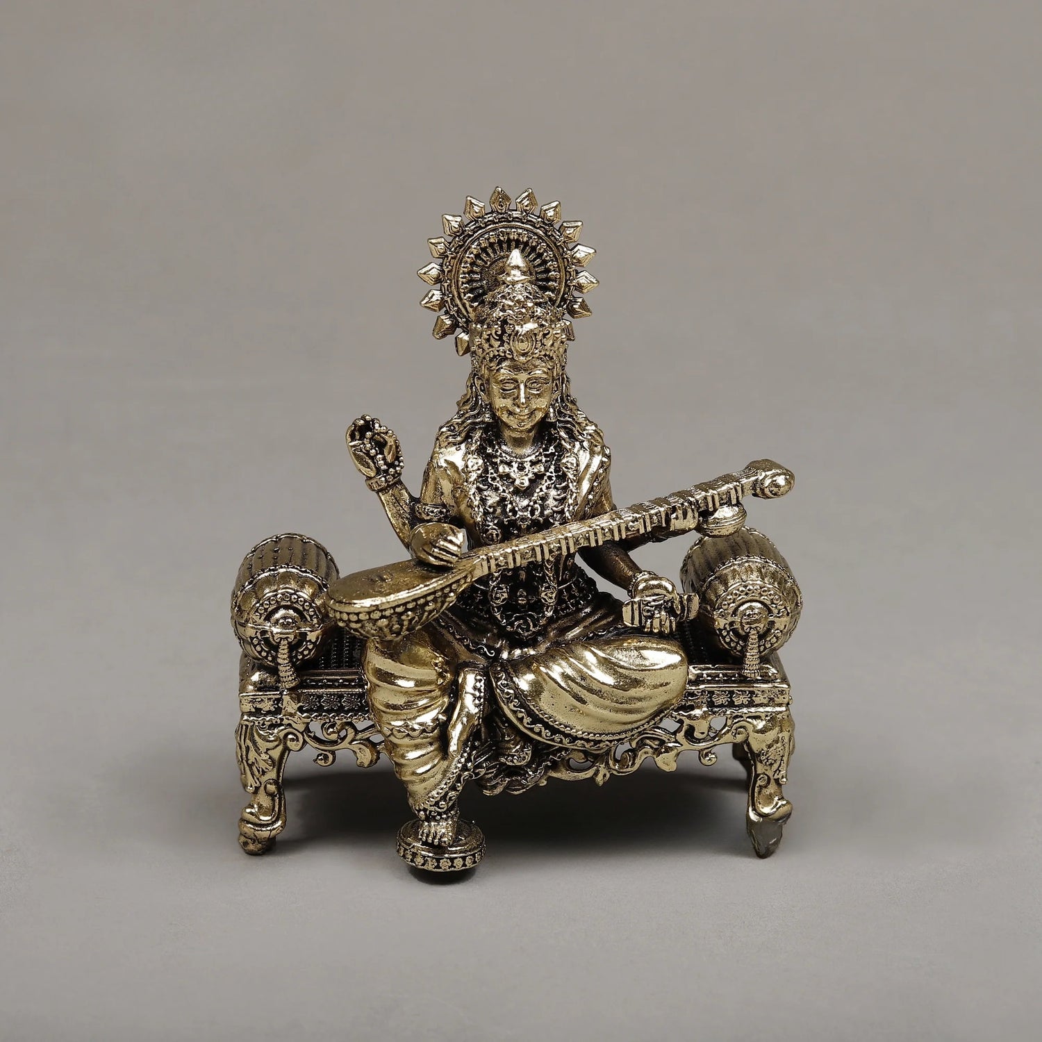 AONA Brass Goddess Maa Saraswati seated Sculpture