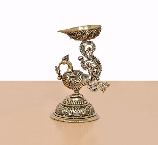 Superfine Brass Oil Lamp On Peacock | Diya Stand Statue (Height: 3 Inches)