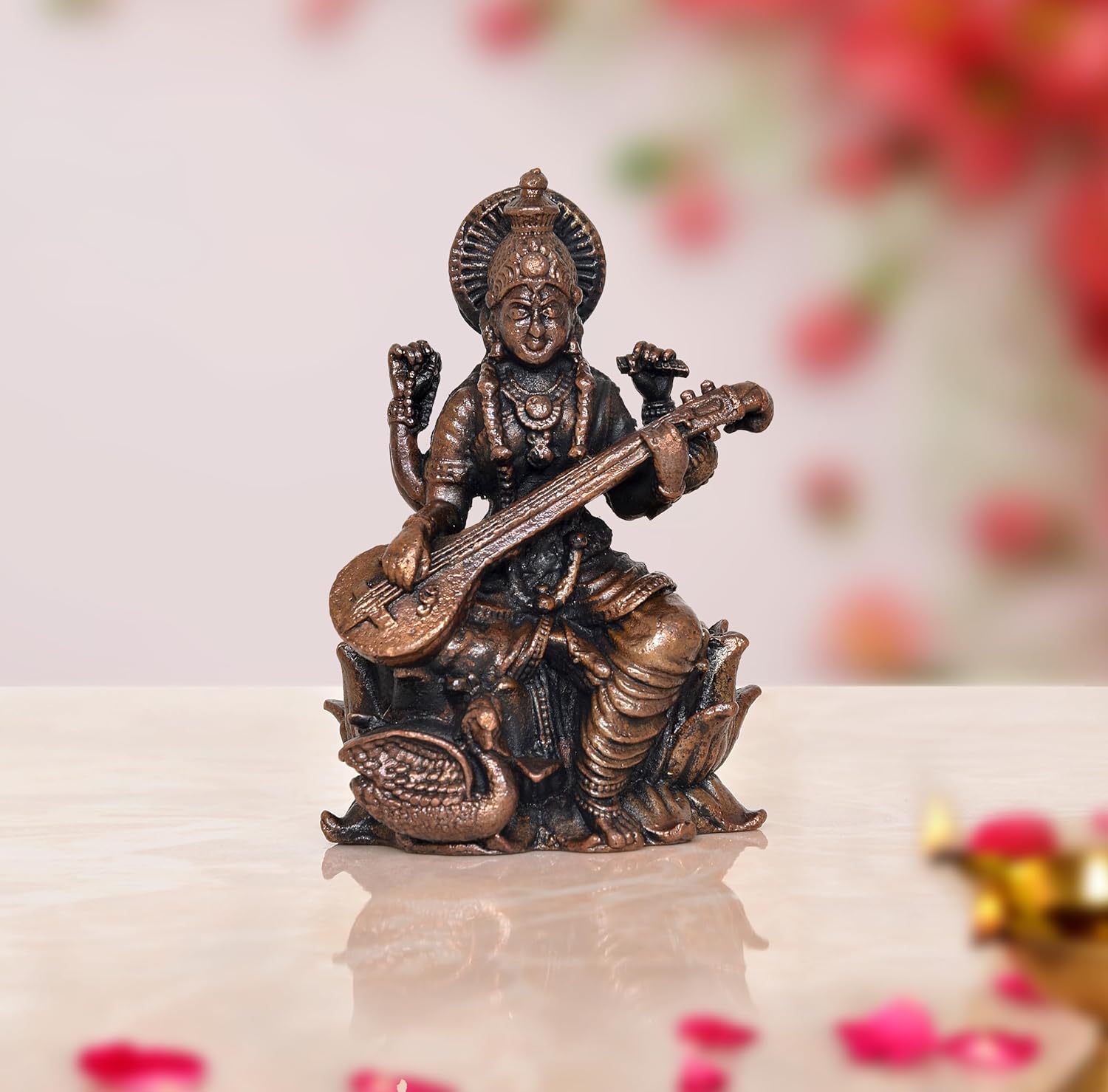 AONA Copper saraswati deity with beautiful detailing dark brown colour perfect for gifting in school