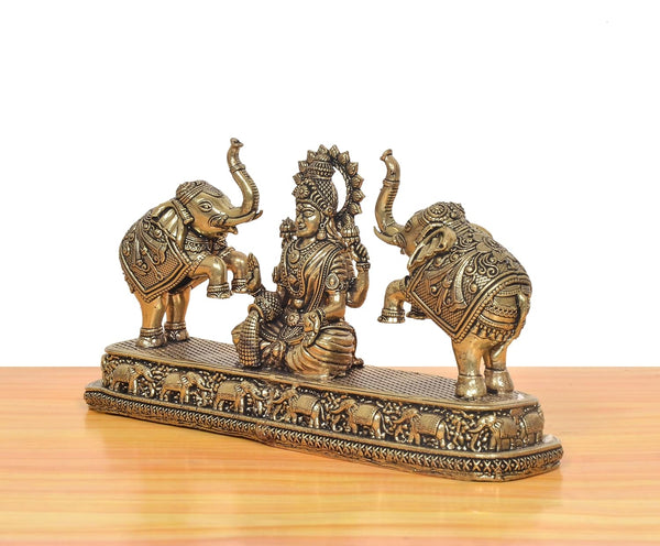 Superfine Brass Gaj Lakshmi Goddess Sitting Statue (Height: 4 Inch) Study Setting