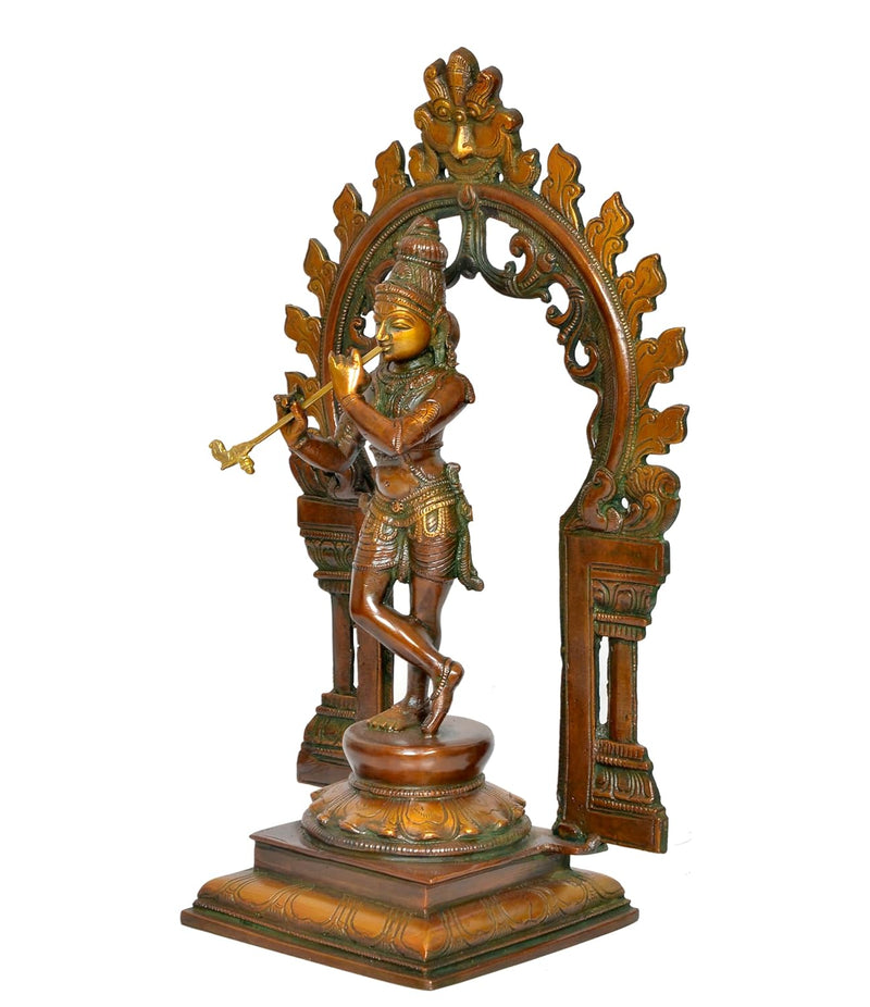 Brass Krishna Playing Flute Idol with Kirtimukha Frame Sculpture (Height: 13 inch)