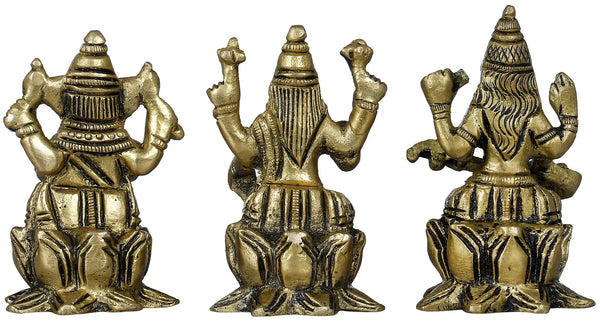 Small Brass Idol of Lakshmi, Ganesha, and Saraswati 2 inches Study Setting