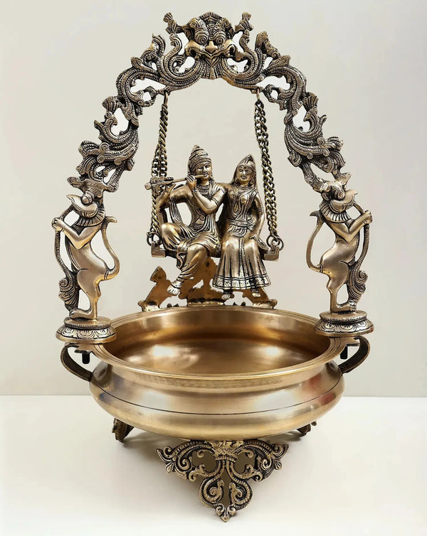 Brass Urli with Radha Krishna on a Swing 21 Inches Mandir Setting