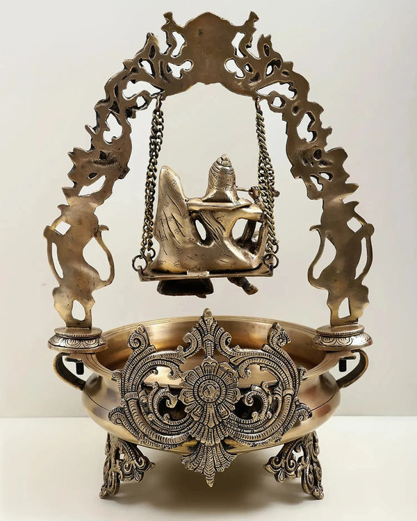 Brass Urli with Radha Krishna on a Swing 21 Inches Study Setting