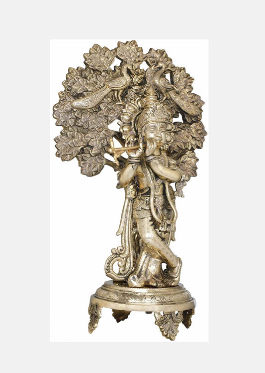 Brass Statue of Krishna Playing the Flute Beneath a Tree with Peacocks