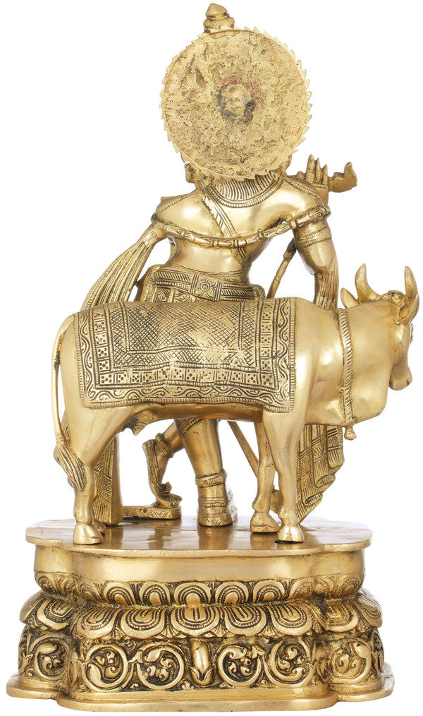 Handmade Brass Sculpture of Tribhang Murari (Krishna) Playing the Flute While the Cow Listens 19 Inches Study Setting