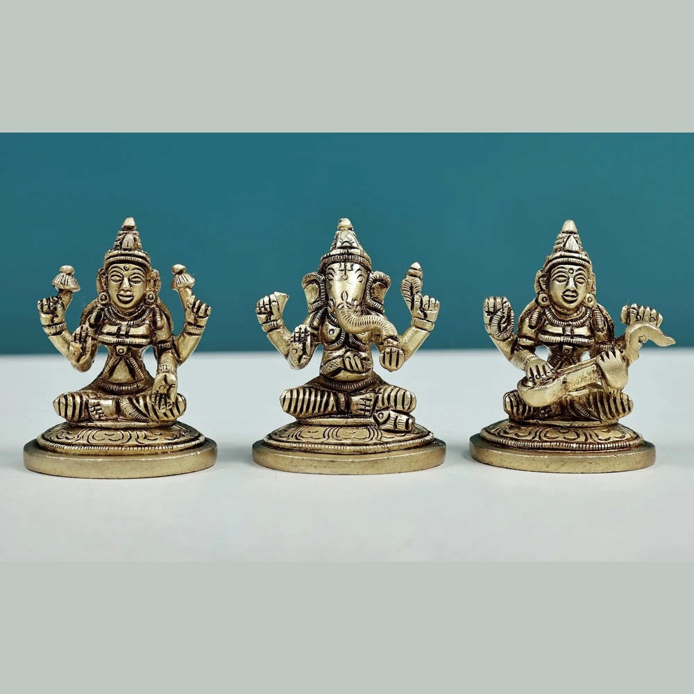 Brass Set of three small statues of Ganesha, Lakshmi, and Saraswati (Height: 2 inches)