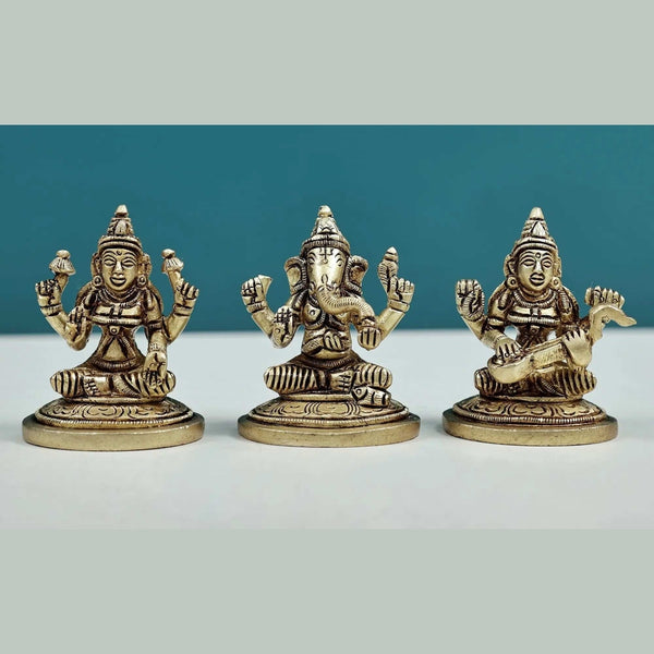 Brass Set of three small statues of Ganesha, Lakshmi, and Saraswati (Height: 2 inches) Mandir Setting