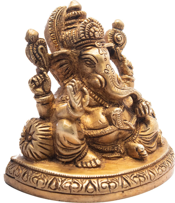 Ganesh Idol Seated Amidst a Plethora of Cushions in Brass 3 inches Entryway Setting