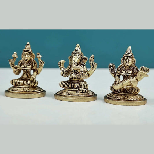 Brass Set of three small statues of Ganesha, Lakshmi, and Saraswati (Height: 2 inches)