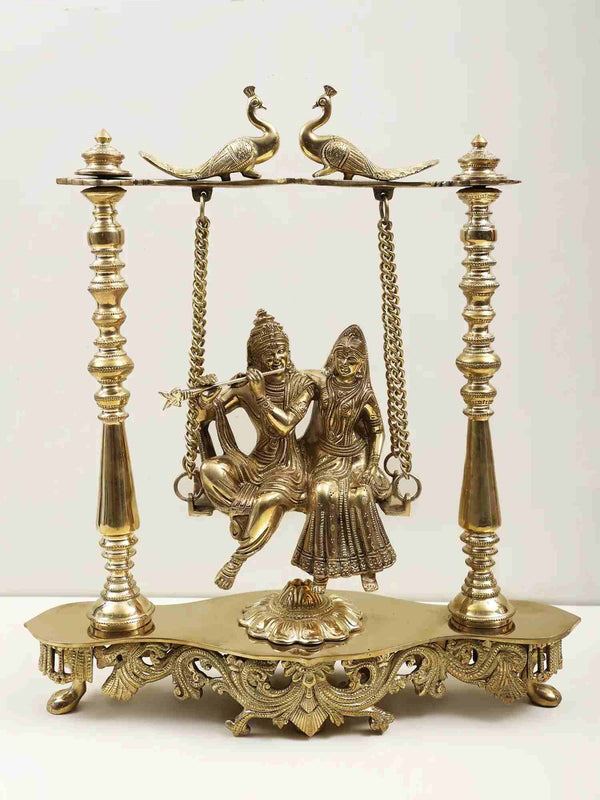Handmade Brass Statue of Radha and Krishna on a Peacock-Perched Swing 15 inches Mandir Setting
