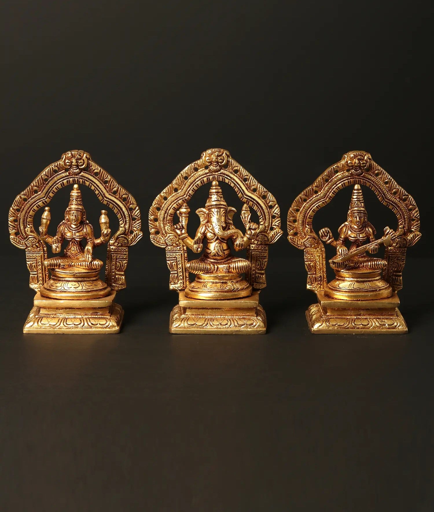 Brass Small trio of Lakshmi, Ganesha, and Saraswati (Height: 5 inches)