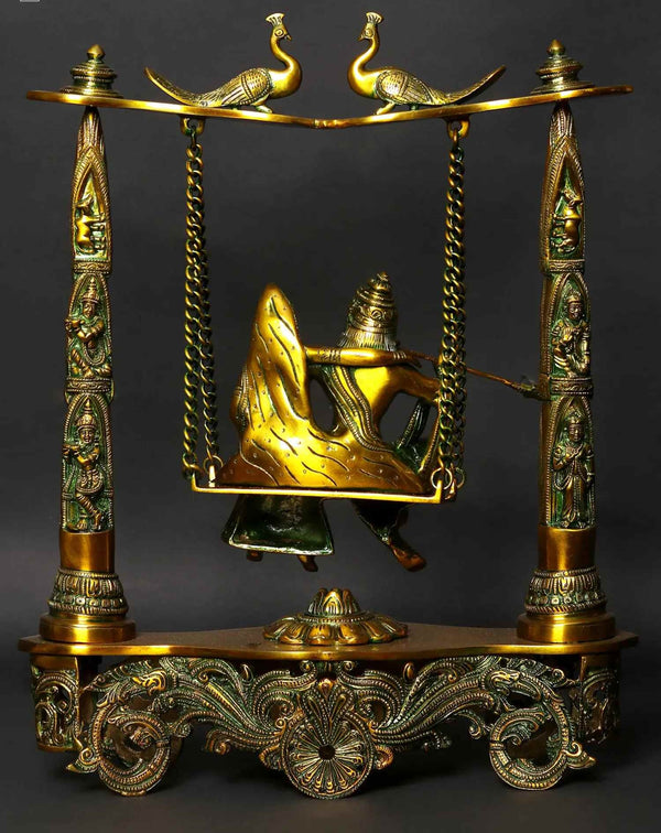 Greenish Gold Brass Statue of Radha Krishna on a Peacock Swing 18 Inches Study Setting