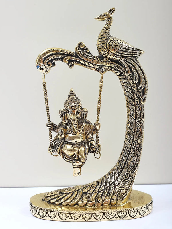 Brass Lord Ganesha on a Peacock-Design Swing 9 inches Mandir Setting