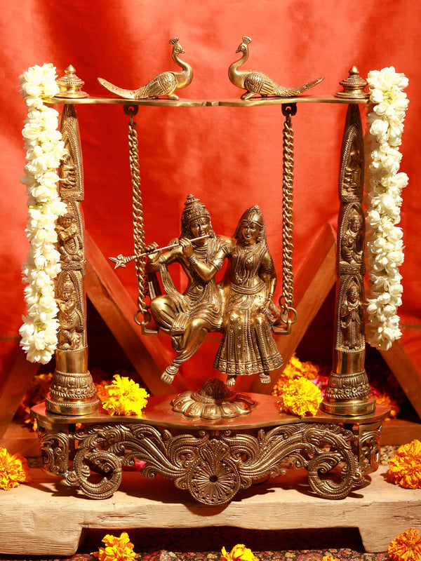 Natural Brass Statue of Radha Krishna on a Peacock Swing 18 Inches Mandir Setting