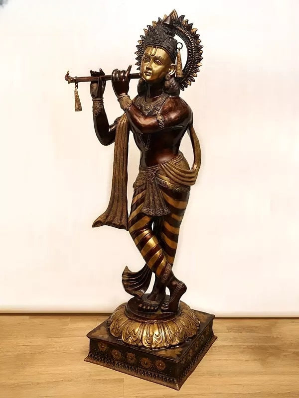 Brass Imposing Lord Murli Krishna, adorned with a long, flowing scarf Idol (Height: 79 Inches) Entryway Setting