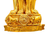 Close-up of golden base with Ashoka chakra wheel and raised Hindi lettering