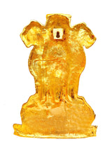 Back view of golden metal lion wall hanging with hanging keyhole
