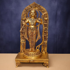 Brass Ram Lala idol: seated deity under ornate arch on pedestal base