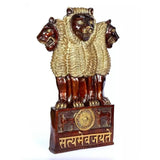 Bronze-red and gold lion emblem statue with base medallion and “सत्यमेव जयते” text