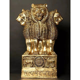 Brass Ashoka stambh emblem statue with lions and central wheel on pedestal