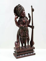 Brass Saraswati figurine standing with veena staff, side view and engraved base