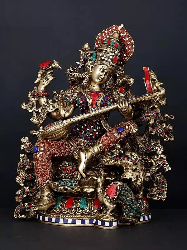Saraswati brass statue, four arms playing veena, ornate red and blue detailing, 16 in