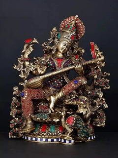 Saraswati brass statue, four arms playing veena, ornate red and blue detailing, 16 in