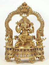 Brass Ganapati idol seated on ornate throne with two attendants, 22 in