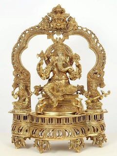Brass Ganapati idol seated on ornate throne with two attendants, 22 in