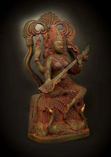 Handmade brass Saraswati idol with veena and raised hands; ornate halo, 7 inches
