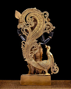 Lord Murugan brass statue, black and gold, side view with garlanded arched halo and staff