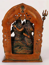 Antique red brass Shiva Parivar idol back view with arch opening and trident symbol