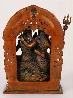 Antique red brass Shiva Parivar idol back view with arch opening and trident symbol
