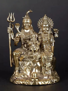 Brass Shiva-Parvati-Ganesha family idol, 4-inch seated figures with trident