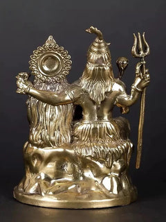 Brass Shiva-Parvati-Ganesha family idol, rear view with detailed halo and trident