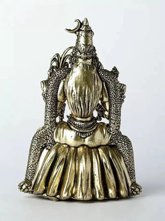 Natural brass Rajarajeshwari statue back view, detailed draped robe, 4 inches