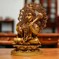 Brass Hanuman ji sitting idol with gada raised, ornate halo and crown detailing.