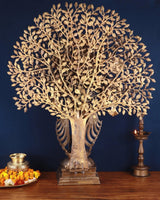 Brass kalpavriksha tree statue with Lord Krishna figure and tiered base pedestal