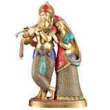 Large standing Radha Krishna brass statue with colorful patterned outfits and flute
