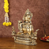 Brass Tara Devi statue seated on ornate lion idol, 16 in height