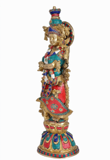 Brass Radha Rani statue, side profile with raised arm, colorful carved details