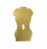 Gold brass flat back emblem piece with cutout hole