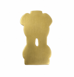 Gold brass flat back emblem piece with cutout hole