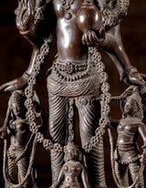 Brass Vaikuntha Vishnu statue close-up: detailed torso, draped lower garment, 26 in