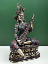 Saraswati statue with veena, seated pose, detailed metalwork and colorful inlay