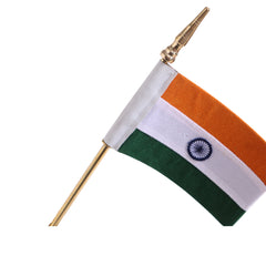 Indian national flag on a brass pole with a pointed finial