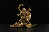 Brass Kali Maa idol with detailed face, flowing attire, and arms raised