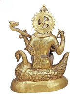 Brass Saraswati goddess statue, side view on swan base with raised symbols and halo
