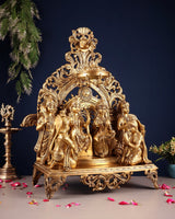 Brass ram darbar idol with golden ornate frame and central deity tableau
